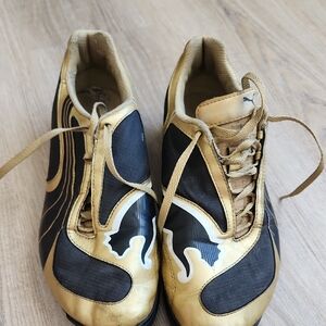 Puma Black and Gold Athletic Sneakers with Wave Accents